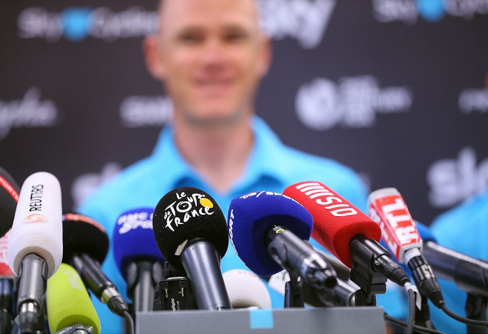 Microphones are ready for Chris Froom at Team Sky's pre-Tour de France press conference.