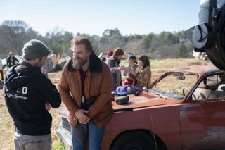 david harbour on a car outside behind the scenes of stranger things season5