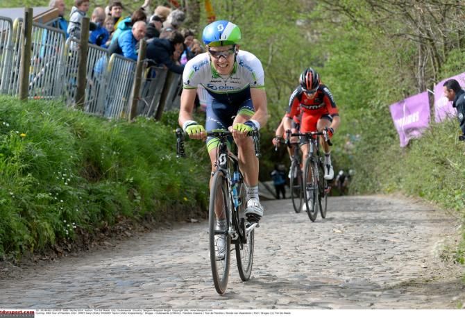 Daryl Impey (Orica-GreenEdge) with a cap and aero helmet