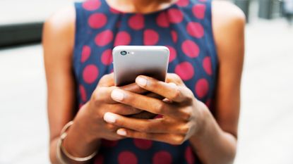 Closer up of woman using smart phone