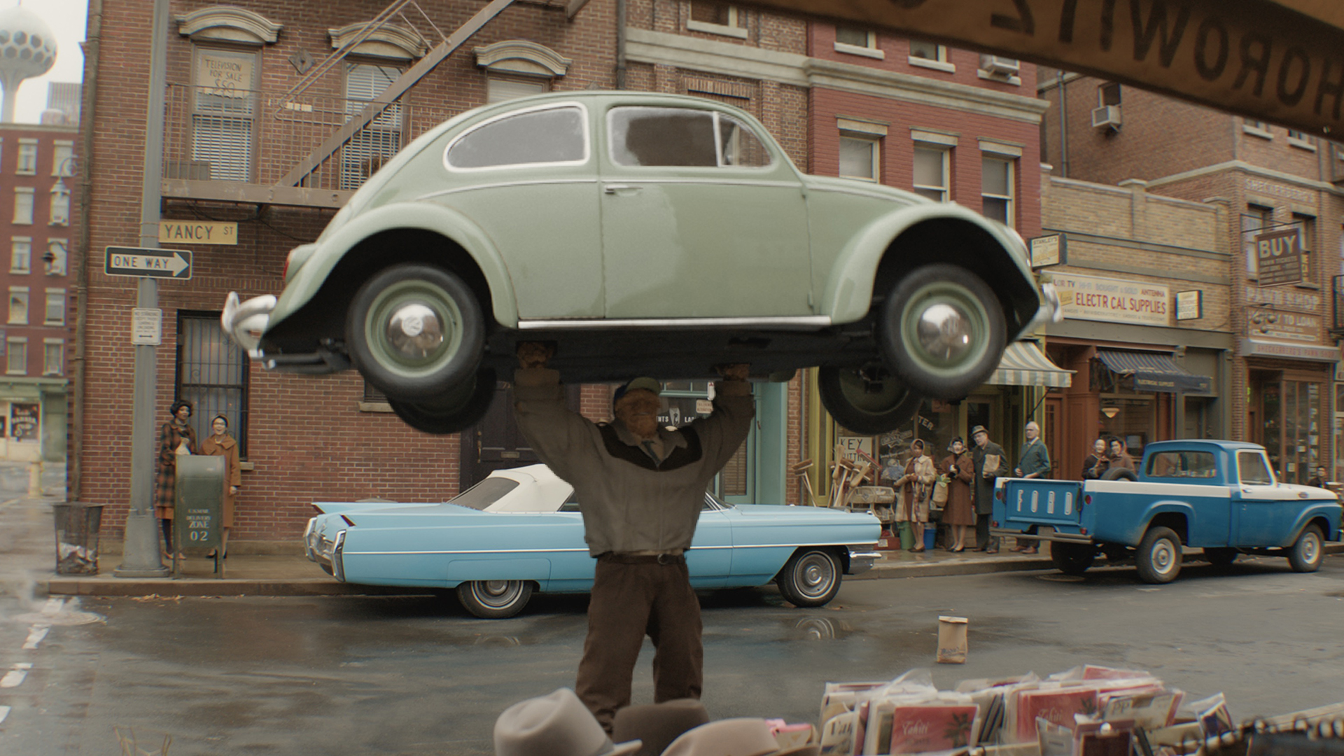 The Thing lifting a Volkswagen Beetle car in The Fantastic Four: First Steps