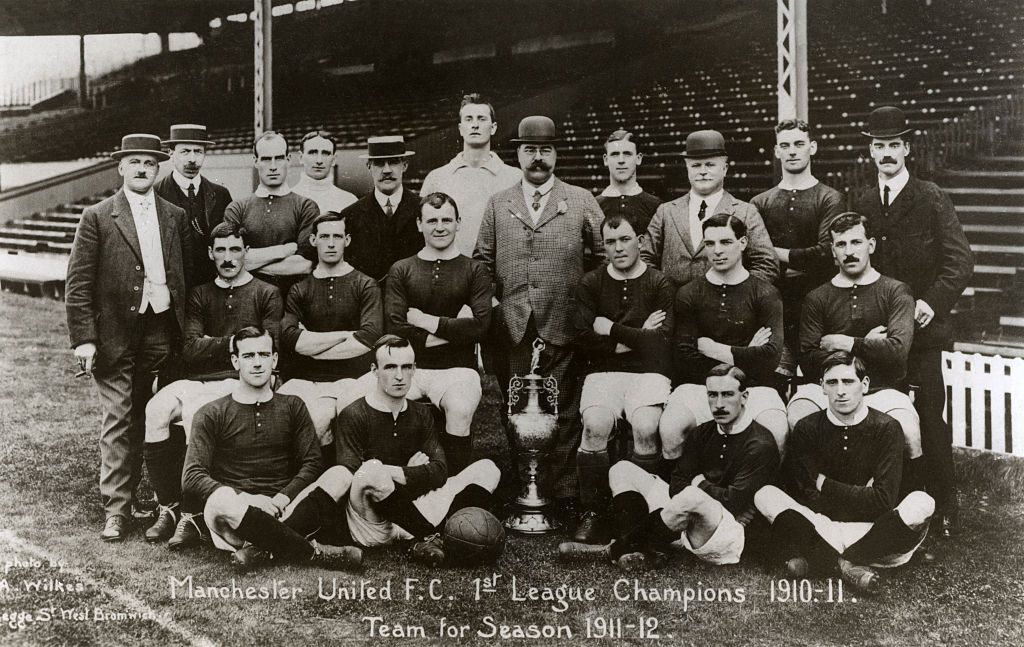 Manchester United football team for 1911-1912 season. Caption reads: Manchester United FC 1st League Champtions 1910-11. (team at that time included: Tony Donnelly, Alex Bell, Mickey Hamill, George Wall, George Anderson, Samuel Blott, Alfred Capper, George Livinstone, Enoch West, Manager Ernest Mangnall )