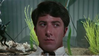 Dustin Hoffman looks to the side with uncertainty in The Graduate.
