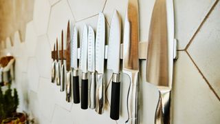 Kitchen knives attached to the wall