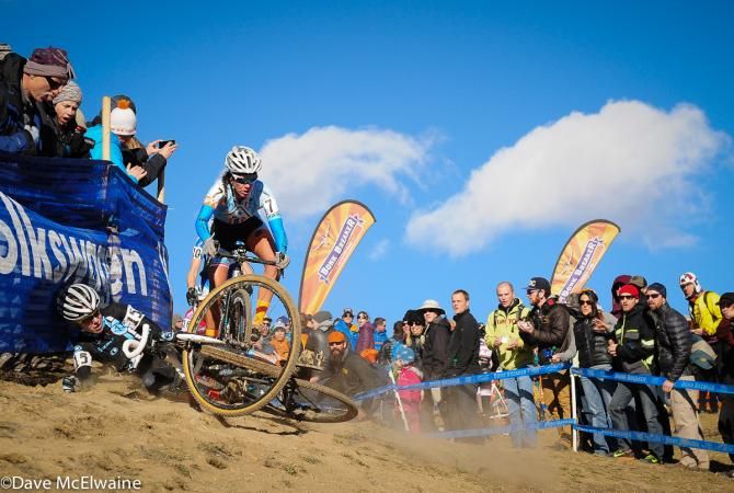 Nicole Duke (Marin Bikes) tries to avoid hitting Chloe Woodruff who crashed on the off-camber hill
