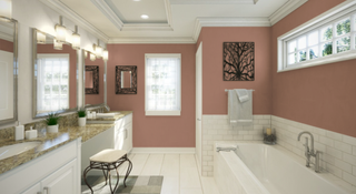 bathroom with dusky pink walls and white tiles
