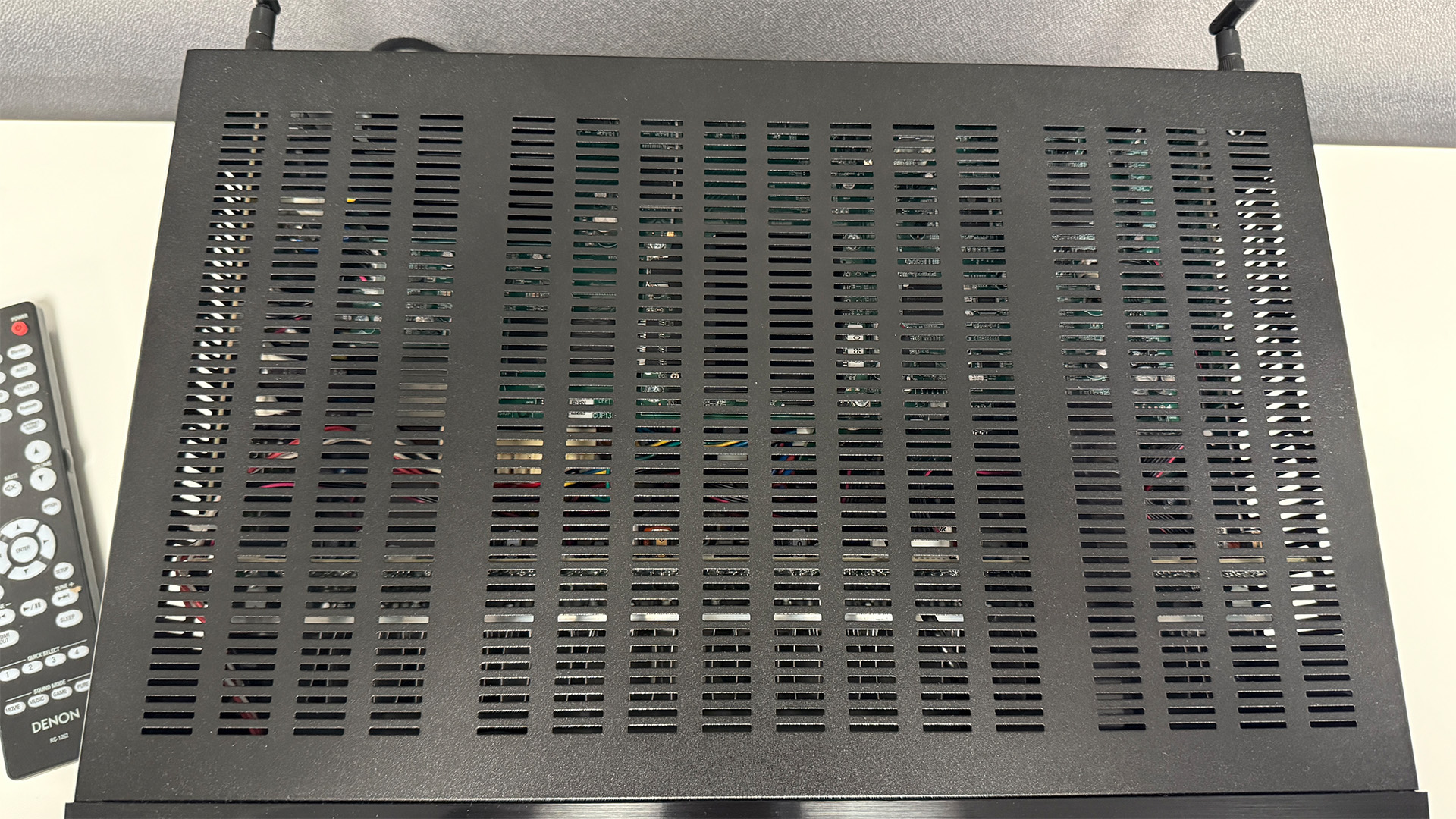Denon AVR-X2900H home cinema amplifier top down view showing internal components through top grille