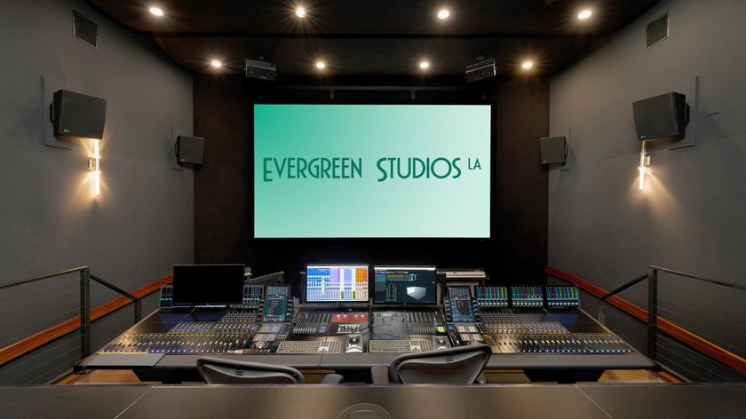 An image of Evergreen Studios in LA with a mixing board and screen showing the logo.