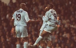 9 MAY 1994: GOALSCORER PETER NDLOVU OF COVENTRY CELEBRATES AFTER SCORING HIS SECOND GOAL, WITH TEAMMATES DION DUBLIN (LEFT) AND JULIAN DARBY IN THEIR FA CARLING PREMIERSHIP MATCH VERSUS TOTTENHAM HOTSPUR AT WHITE HART LANE, LONDON. Mandatory Credit: Anton Want/ALLSPORT