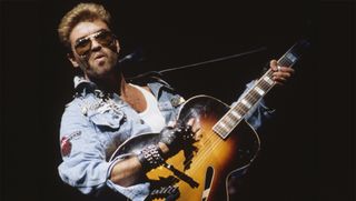English singer and songwriter George Michael (1963-2016) performing on stage playing a semi acoustic guitar during the Japanese/Australasian leg of his Faith World Tour, February-March 1988. 