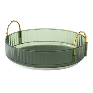 A green tinted ribbed Lazy Susan organizer with gold handles