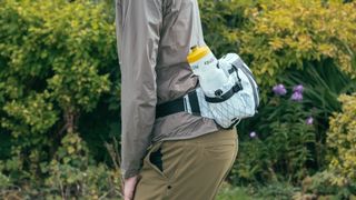 a white and black hip pack