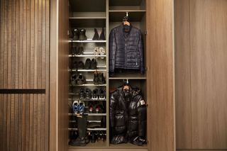 Ceiling height wooden storage for coats and shoes