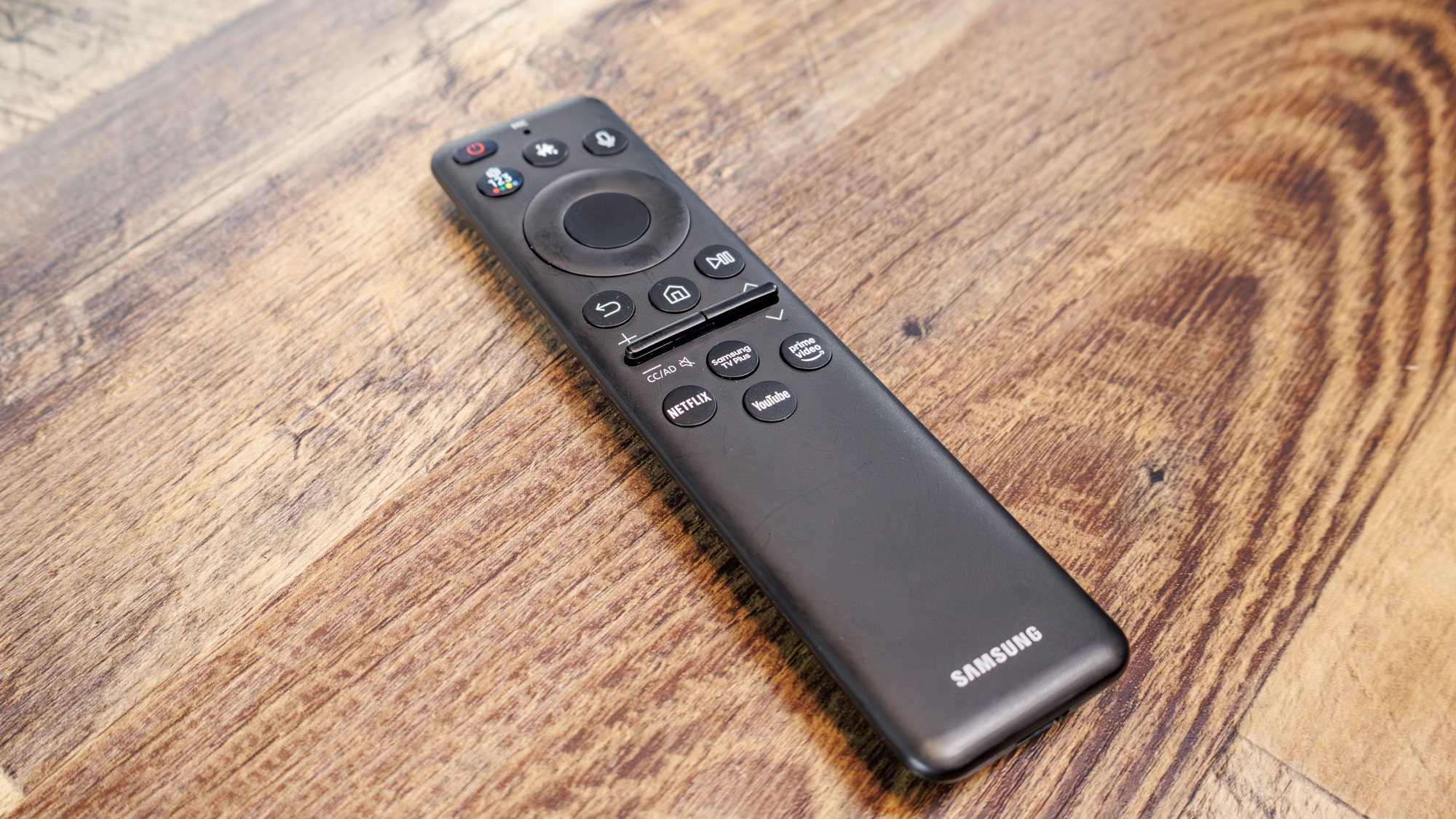 The remote for a Samsung OLED S90H 4K TV