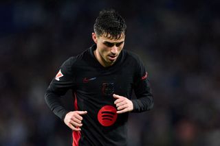 Pedro 'Pedri' Gonzalez of FC Barcelona looks on during the LaLiga match between Real Sociedad and FC Barcelona at Reale Arena on November 10, 2024 in San Sebastian, Spain. (Photo by