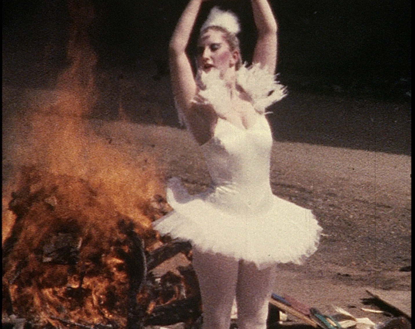 Film still of woman in tutu beside a bonfire, from &amp;lsquo;Unruly &amp;ndash; The Body in Punk&amp;rsquo; at ARoS in Aarhus, an exhibition exploring the history of punk