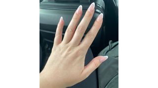 Photo showing acrylic nails with French tip