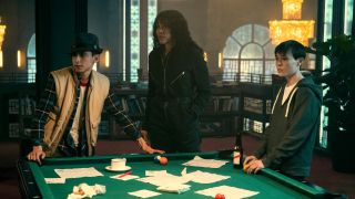Five, Allison and Viktor standing around pool table in The Umbrella Academy
