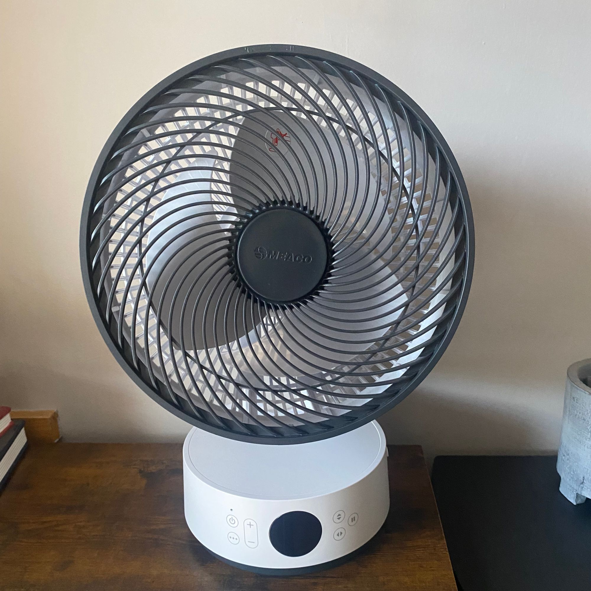 Meaco Sefte Pro table top air circulator on a wooden side table