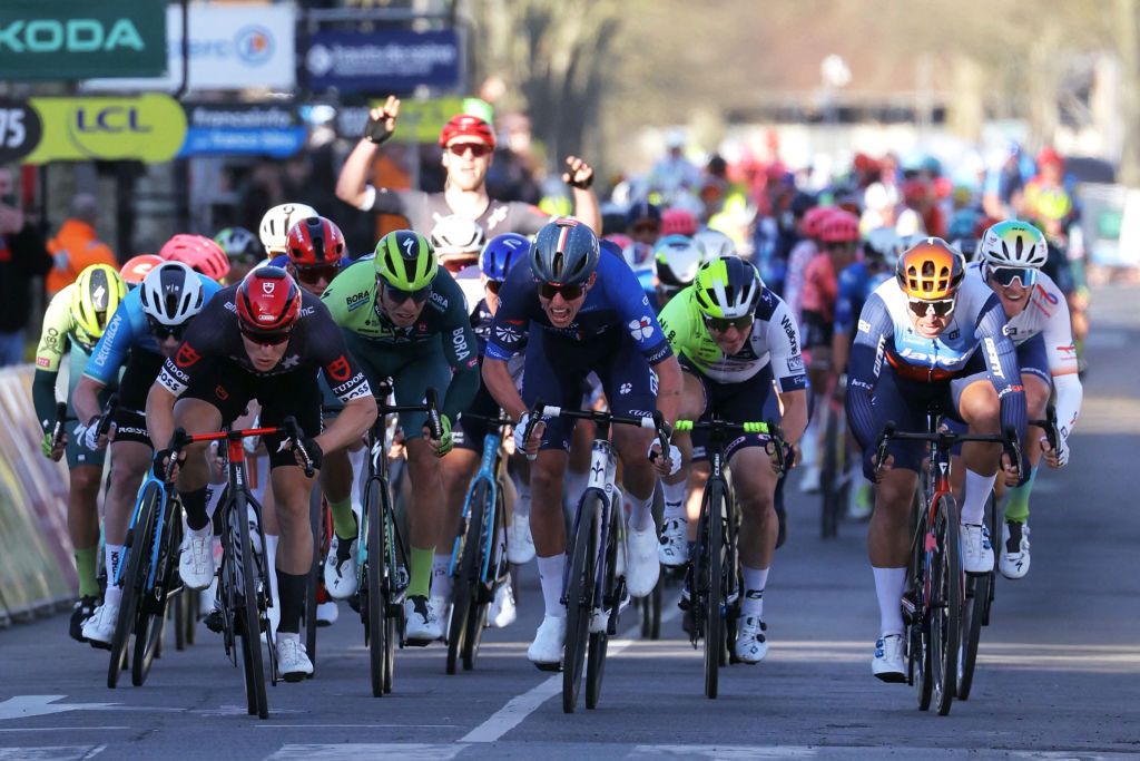 Tudor Pro Cycling Team's Dutch cyclist Arvid De Kleijn (L) sprints to win the 2nd stage of the Paris-Nice cycling race, 179 km between Thoiry and Montargis, on March 4, 2024. (Photo by Thomas SAMSON / AFP)