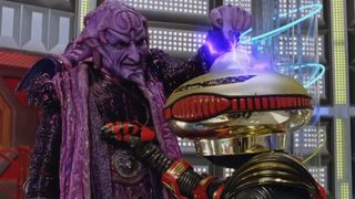 Ivan Ooze unleashes a spark of lightning on Alpha 5 in Mighty Morphin Power Rangers