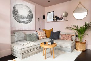 A living room painted entirely pink