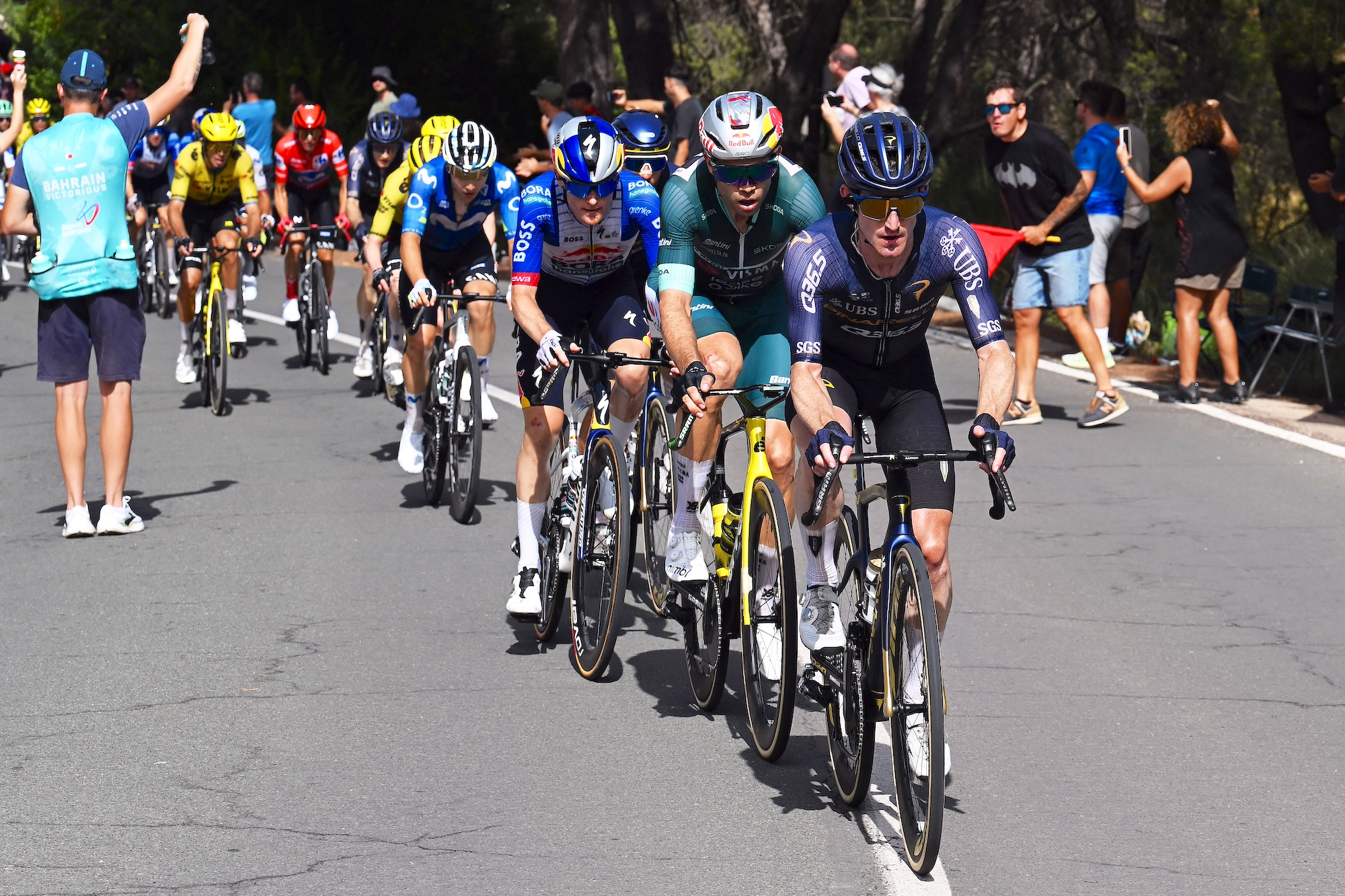 Wout Van Aert of Belgium and Team Visma | Lease a Bike - Green Points Jersey and Eddie Dunbar of Ireland and Team Pinarello - Q36.5 Pro Cycling compete during stage 11