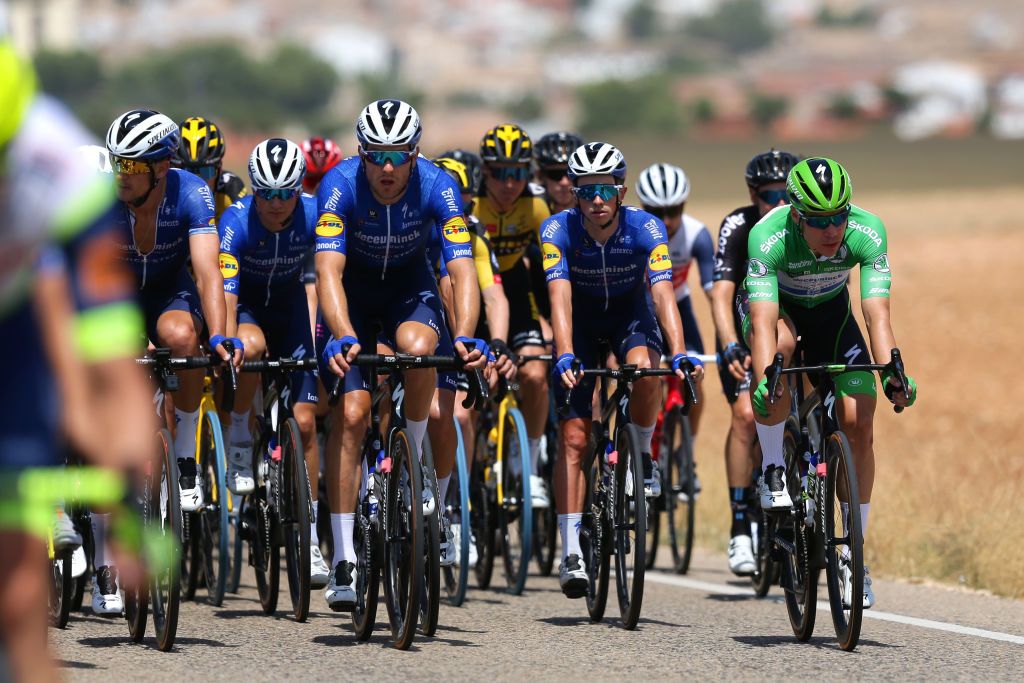 ALBACETE SPAIN AUGUST 18 Fabio Jakobsen of Netherlands and Team Deceuninck QuickStep Green Points Jersey and Teammates during the 76th Tour of Spain 2021 Stage 5 a 1844km stage from Tarancn to Albacete lavuelta LaVuelta21 on August 18 2021 in Albacete Spain Photo by Gonzalo Arroyo MorenoGetty Images