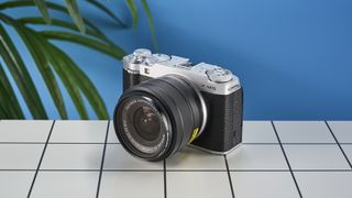 A Fujifilm X-M5 mirrorless vlogging camera in the silver colorway