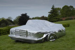 Silver car sculpture. Park of Erwin Wurm exhibition at Yorkshire Sculpture Park