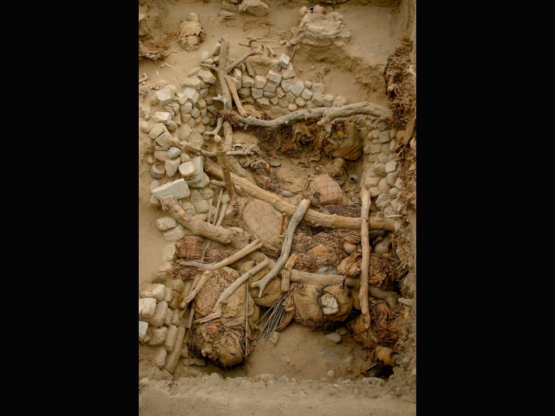 Images of the Pachacamac site near Lima Peru, with various funerary bundles and their corresponding feathers.