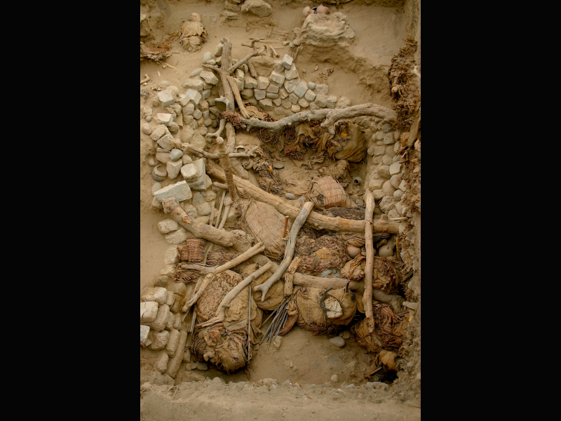 Images of the Pachacamac site near Lima Peru, with various funerary bundles and their corresponding feathers. 