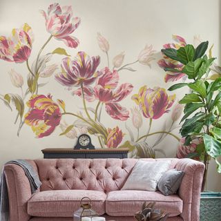 living room with floral wallpaper and sofa