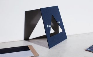 Midnight blue card, with a cut out