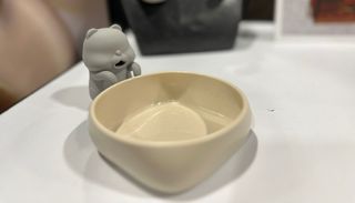 I caught laryngitis at CES, but this teeny cat robot can save me with perfect drink management