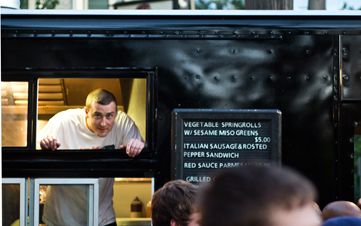 Fahrenheit Truck guys drumming up business at the Great Food Truck Race Finale Watch Party