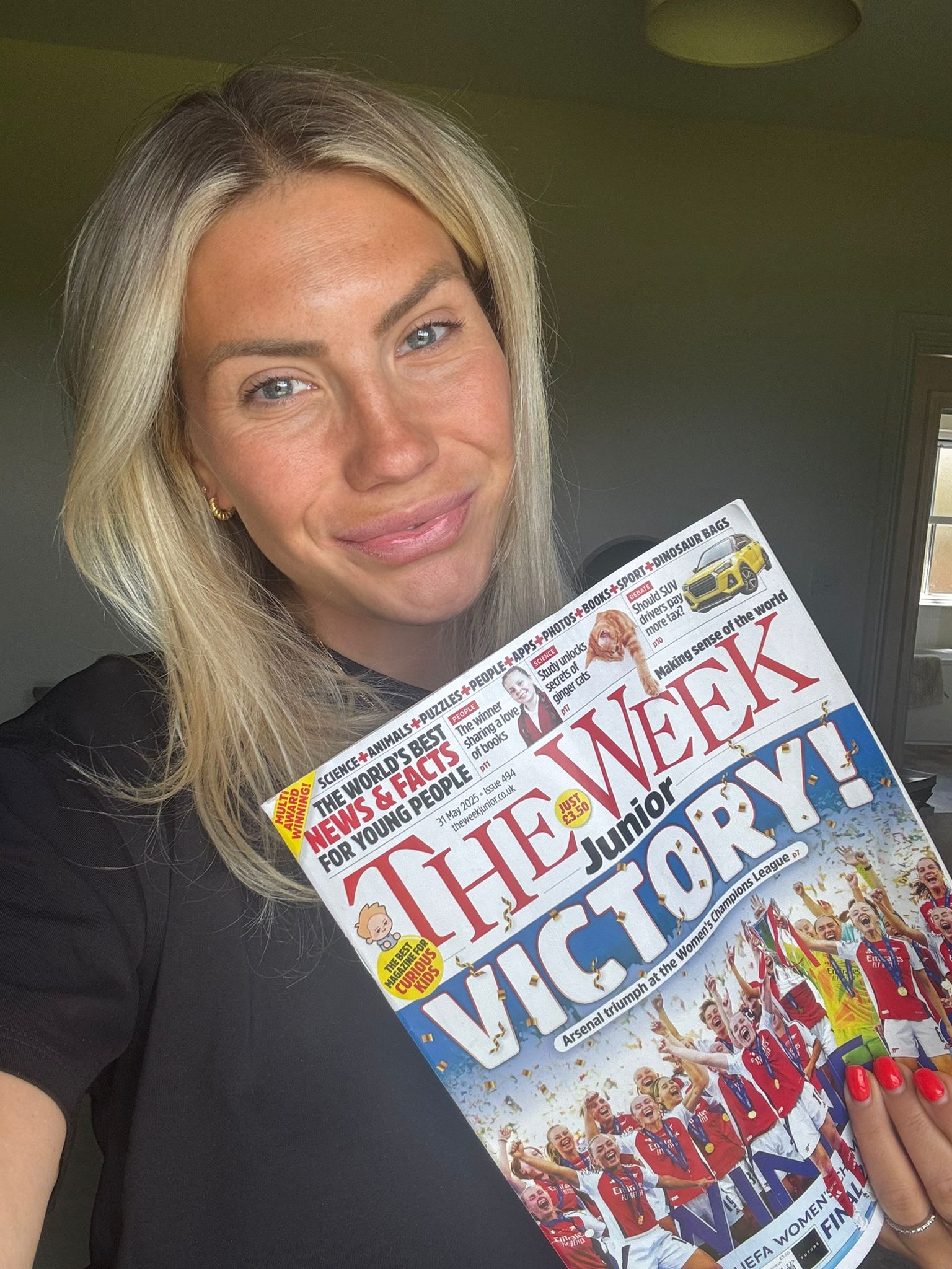 Harriett with The Week Junior magazine