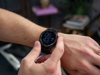 Samsung Galaxy Watch 4 worn in hand