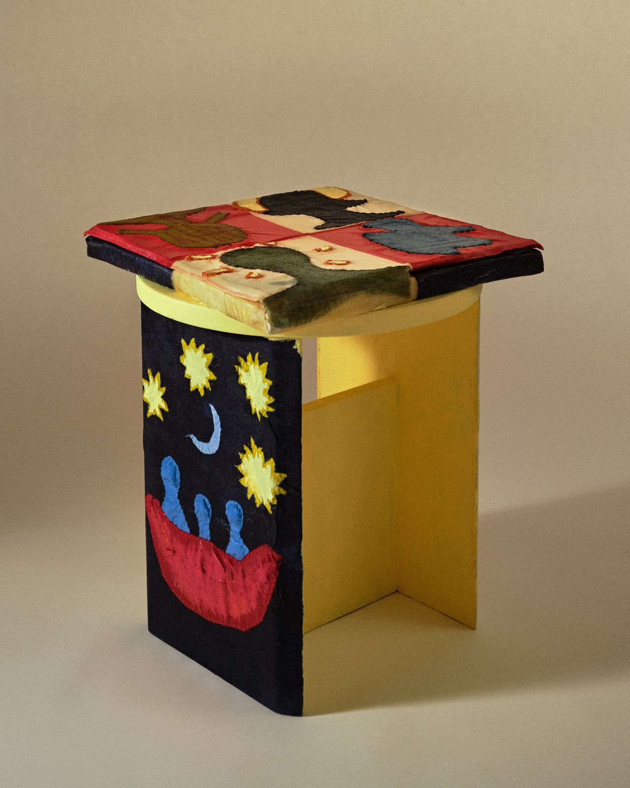 A fanciful envisioned stool presents colorful decorations on a wooden structure.
