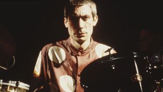 Rolling Stones drummer Charlie Watts at his kit, 1976.