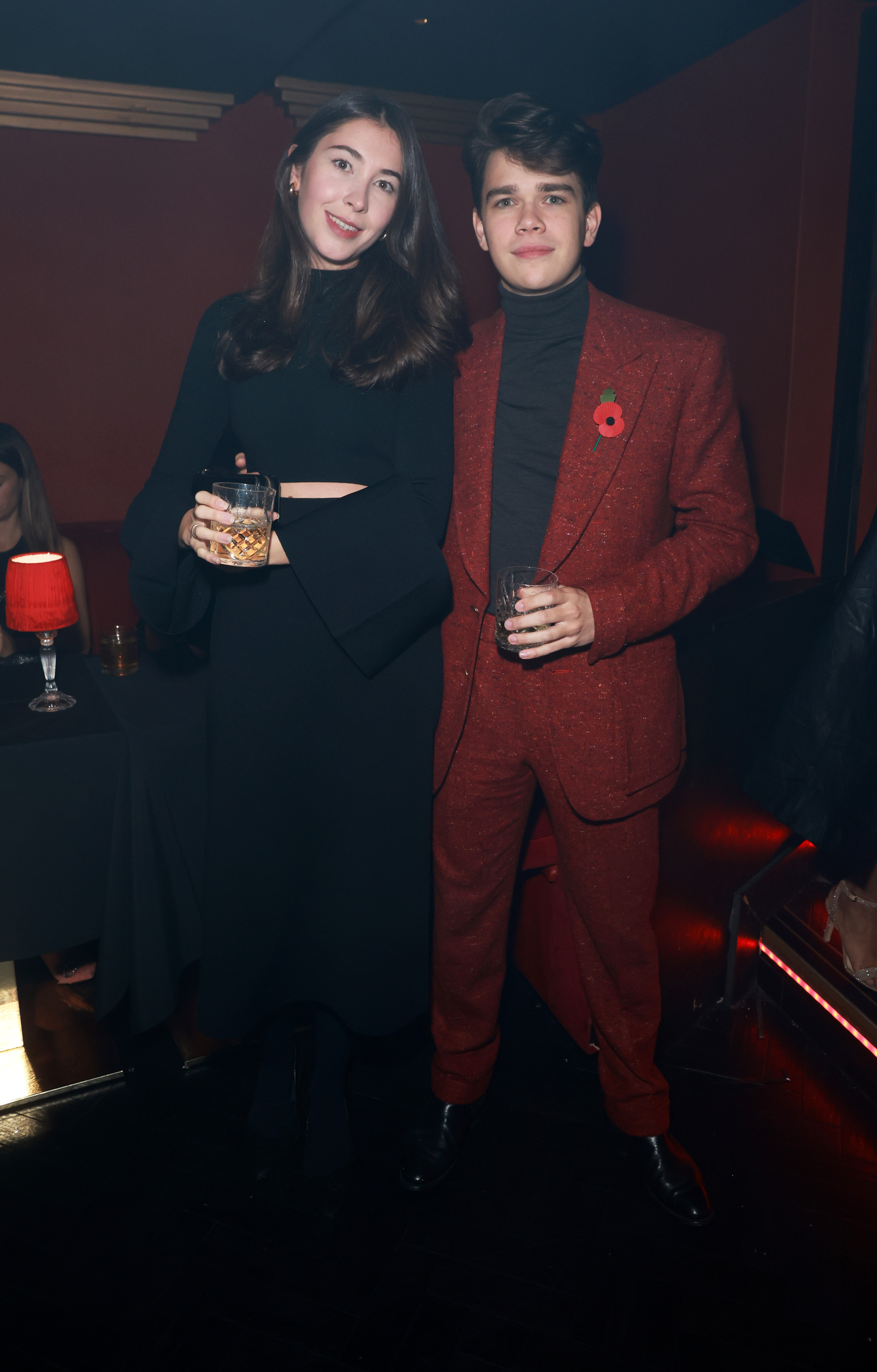 Sam Chatto and girlfriend Eleanor holding drinks