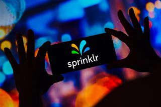 Sprinklr logo on a smartphone