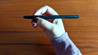 Ugee UE12 Plus review; a drawing table unboxed with cables and stylus