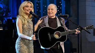 (l-r) Sabrina Carpenter and Paul Simon perform "Homeward Bound" on February 16, 2025 