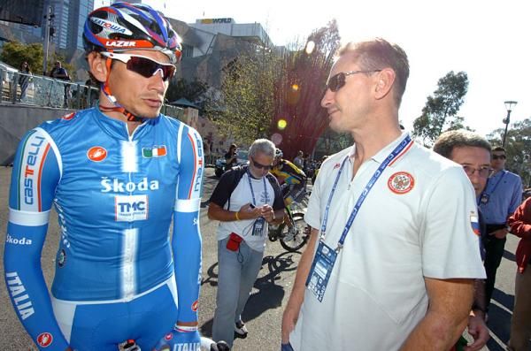Filippo Pozzato (Italy) speaks with Dmitri Konyshev at the start in Melbourne.