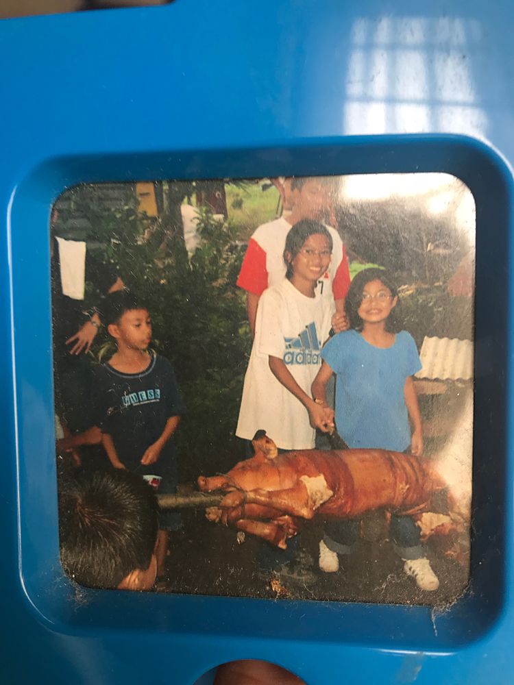 Old photo of Coryn and her sister in the Philippines when she was 9 years old