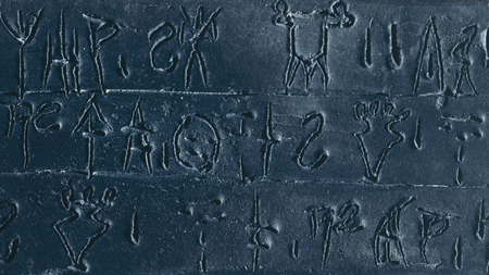 a series of three bands of linear B text