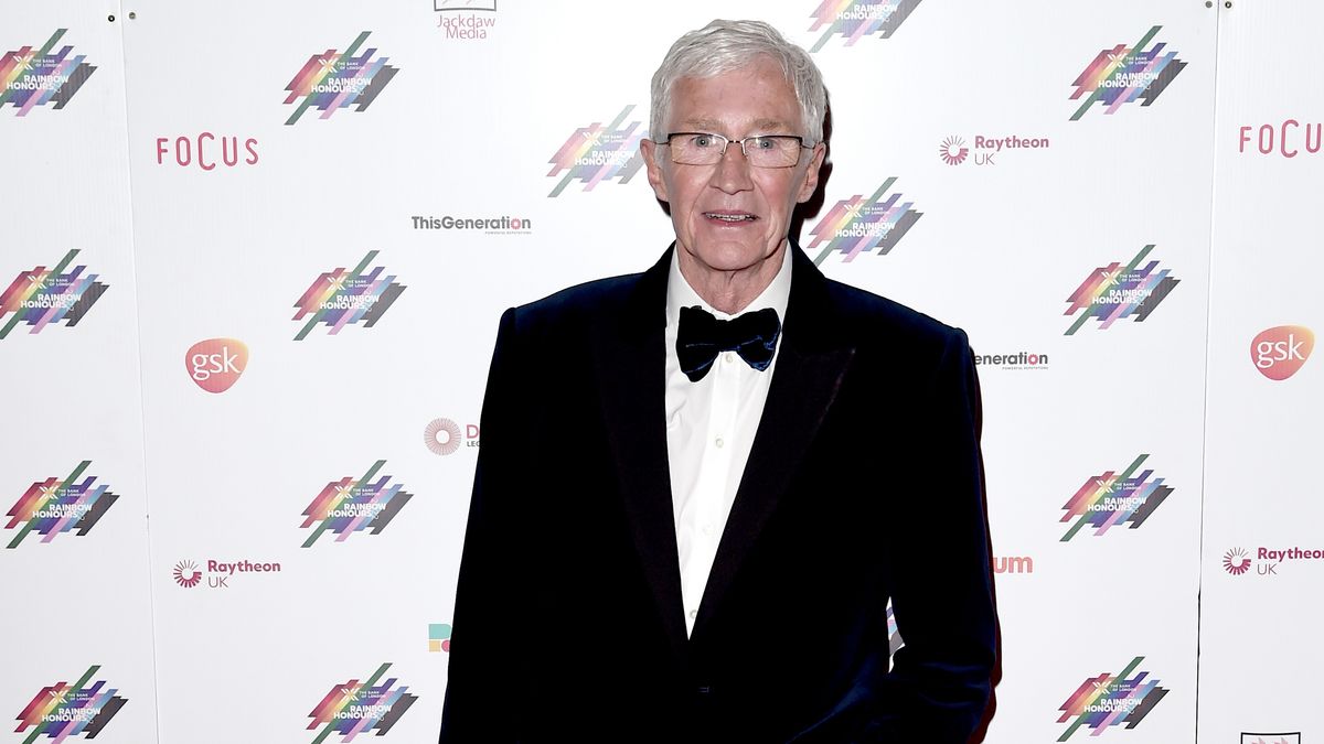 Paul O&#039;Grady on a red carpet in black tie in 2022