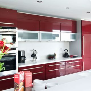 kitchen with red cabinets