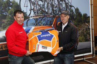 Rabobank directors Frans Maassen and Nico Verhoeven display the team's special jersey for the Giro d'Italia